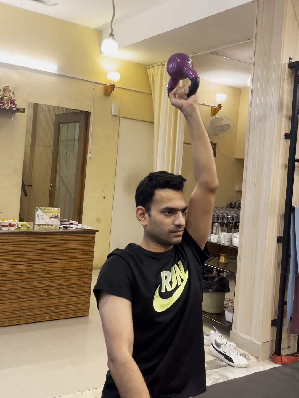 Physiotherapist treating a patient at home in Gurugram