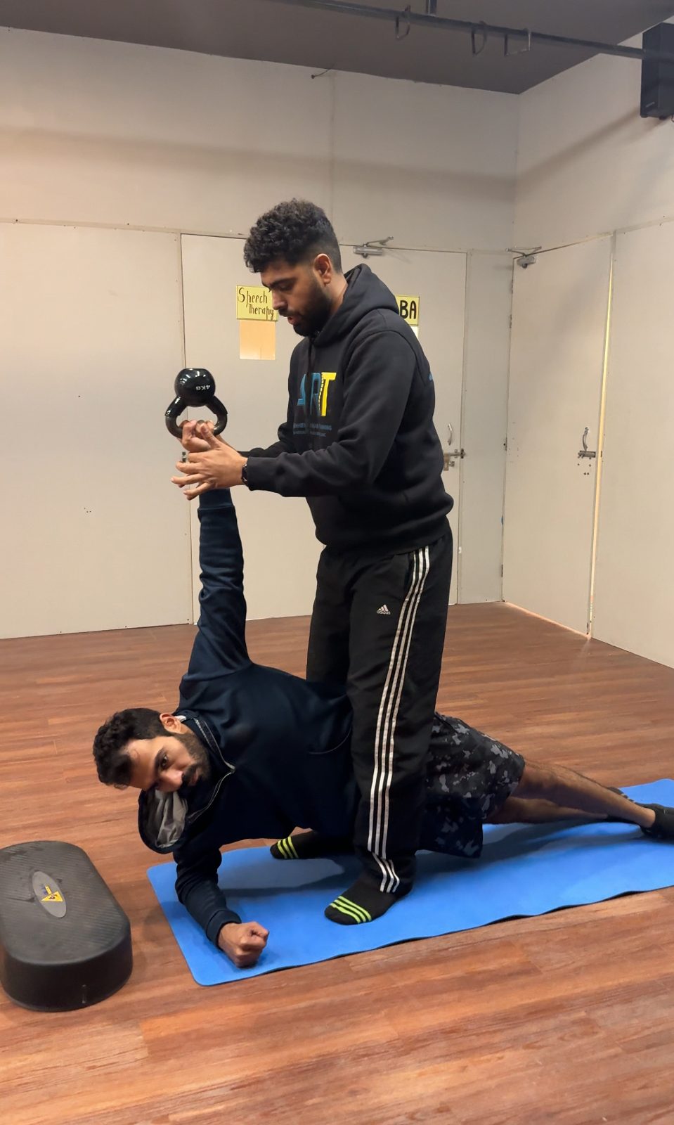 Physiotherapist assessing knee pain during rehabilitation at ART Physiotherapy Clinic, Sector 58 Gurugram