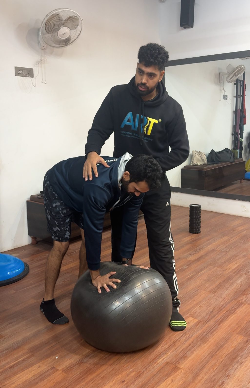 Assisted shoulder rehabilitation exercise with physiotherapist